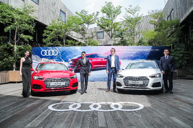 Đại diện Audi Việt Nam cùng cặp đôi Công Vinh - Thủy Tiên trong dịp ra mắt mẫu xe mới và đại sứ thương hiệu